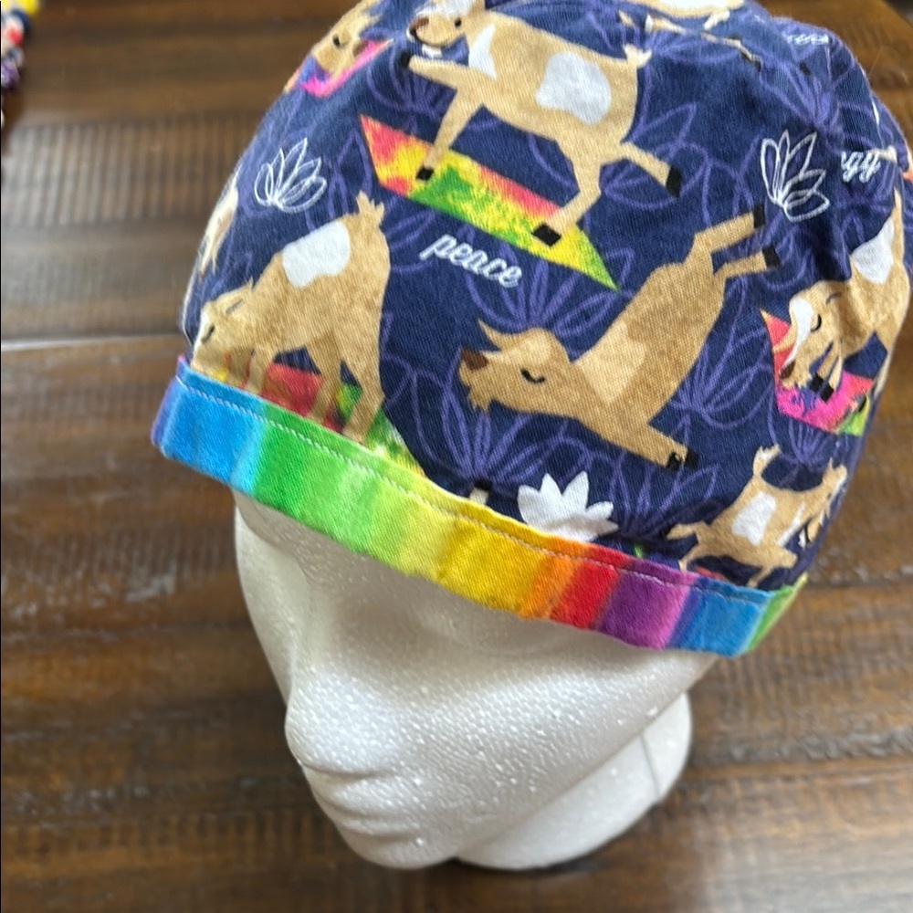Fun Colorful Scrub cap with goats doing yoga.